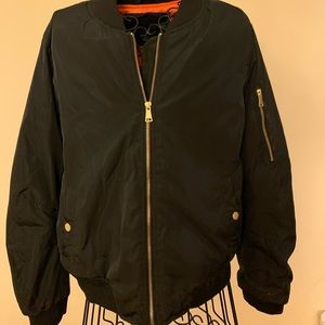 Black Bomber Jacket with Orange Inside